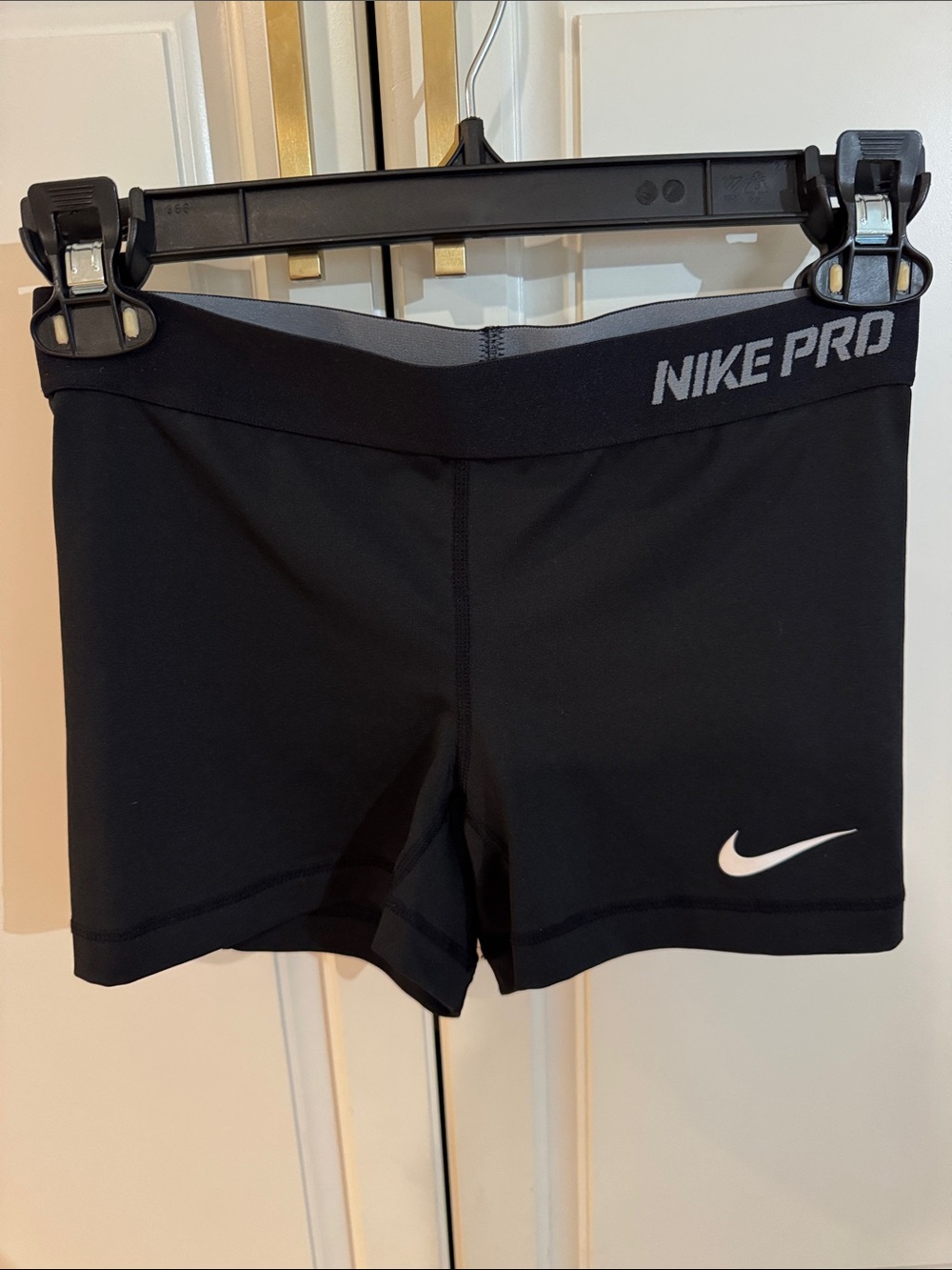 Nike Pro Black Athletic Shorts with White Swoosh